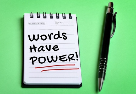 40516957 - words have power word on notebook page